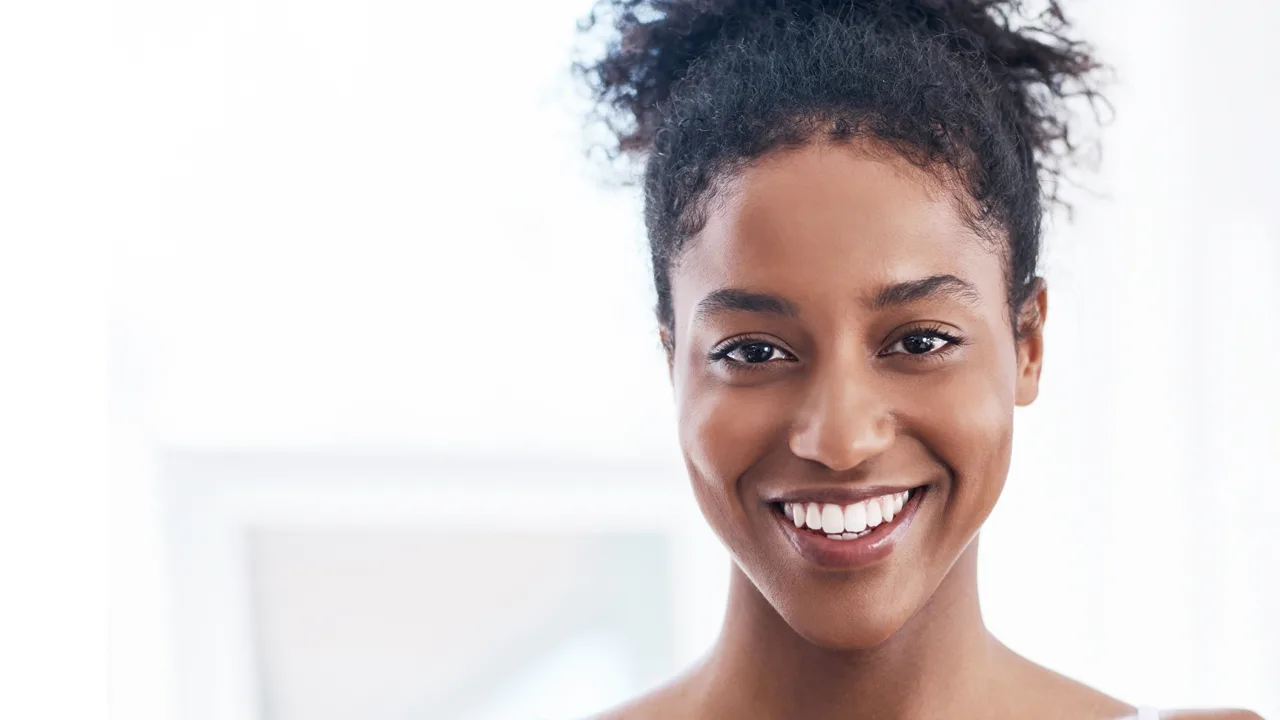 Smiling patient representing a personalised cosmetic dentistry consultation